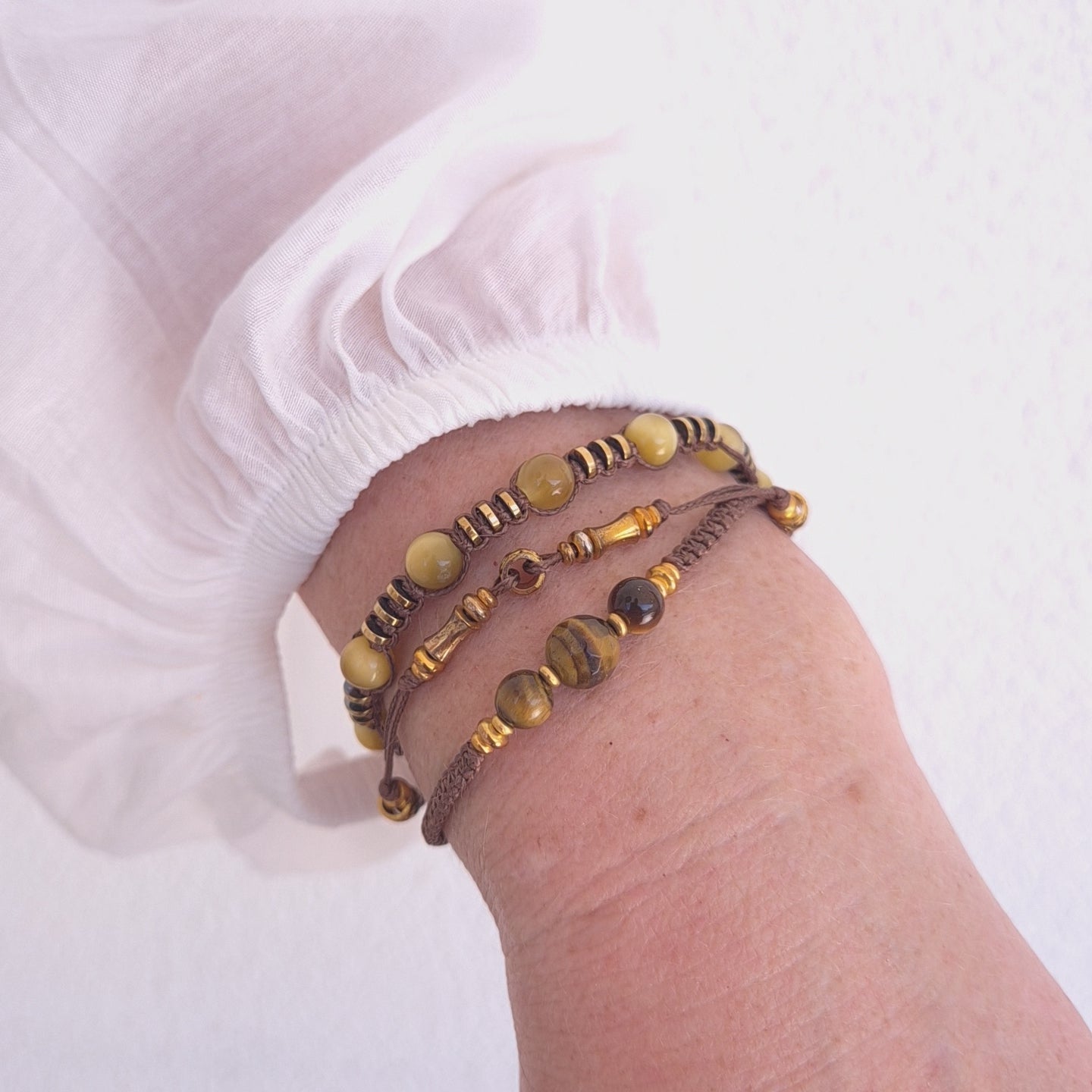 The Tiger’s Eye Wanderer: Hand-Woven Multi-Layer Wrap Bold. Grounded. Radiant.